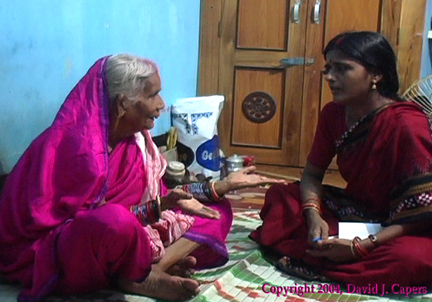 Sashimani Mahari talking with Chapala Mishra in Puri, Orissa, 2004.