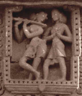Click on photo of Odissi flautist sculpture to see more Orissi sculptures. Photo  1998, David J. Capers